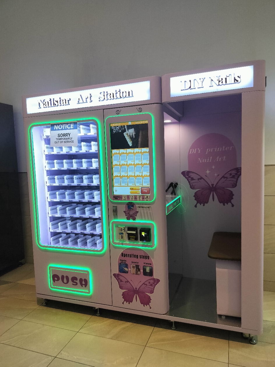 The full lavender Nailstar Art Station and DIY booth with a temporary service notice during installation.
